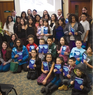 Young Indigenous and Latinx authors proudly display their published books at the 3rd Nuestros Cuentos book reception hosted by MSUFCU.
